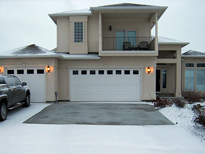 A heated concrete driveway after a storm.