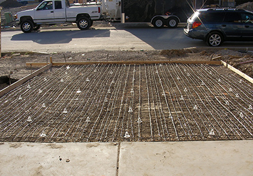 Mesh-Ups shown supporting remesh in a heated driveway installation.